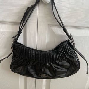 Burberry black patent over the shoulder small bag.